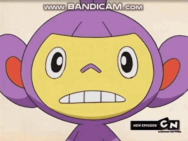 a cartoon monkey is sitting on top of a yellow monkey .
