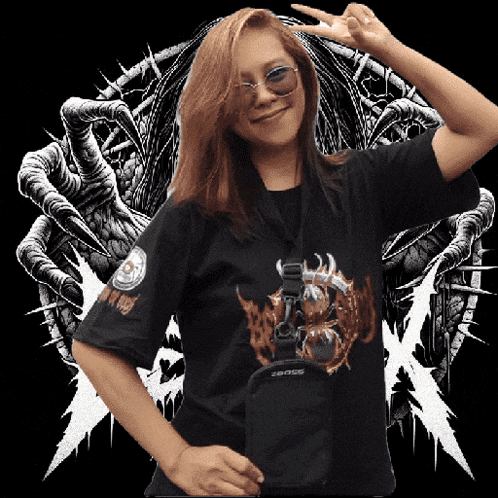 a woman wearing a black shirt that says chaos