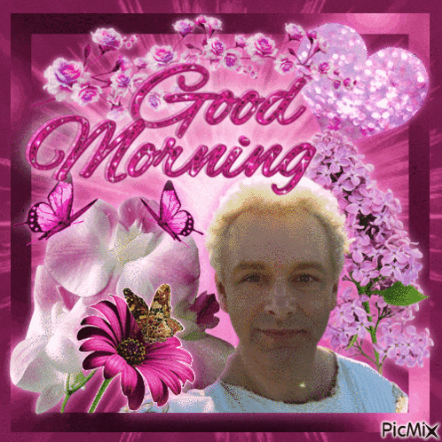 a picture of a man surrounded by pink flowers with the words good morning