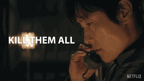 a man is talking on a phone with the words kill them all written above him