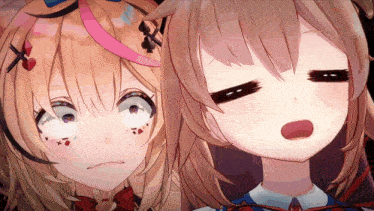 a close up of two anime girls making faces