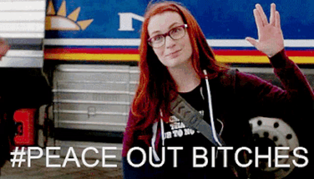 a woman waving in front of a bus with the words #peace out bitches