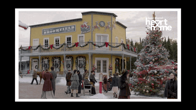 a yellow building with a sign that says hotel brookfield on it