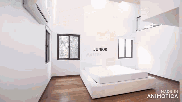 a bedroom with a bed and a sign that says junior master made in animotica