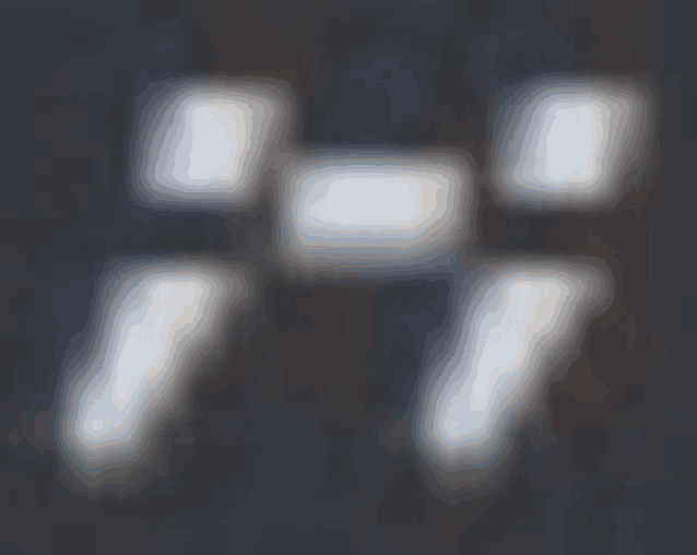 a blurred image of a person 's feet on a black background .
