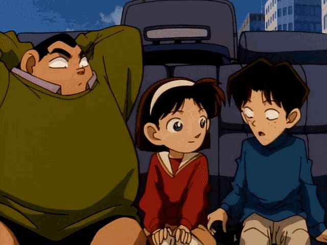 a group of cartoon characters including a boy and two girls