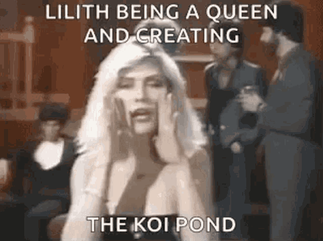 a woman is being a queen and creating the koi pond in a video .