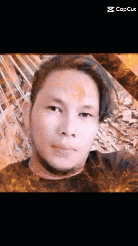 a close up of a man 's face with a capcut watermark
