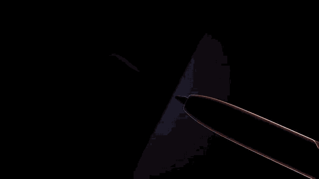 a pen is being used to write on a cell phone screen