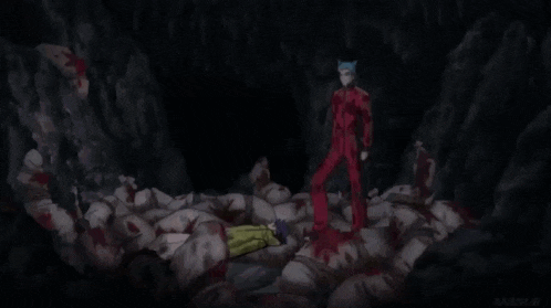a person with purple hair and a yellow jacket is laying on a bed with blood on it .