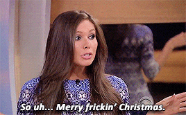 a woman is saying merry fricking christmas