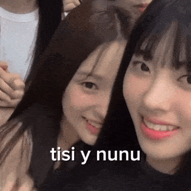 a group of young girls are posing for a picture and one of them says ' tisi y nunu ' on the bottom