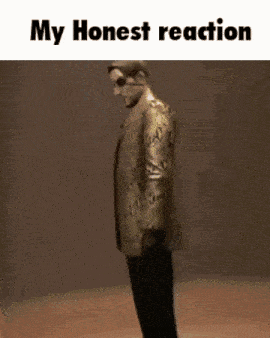 a picture of a man in a gold suit with the words " my honest reaction " below him