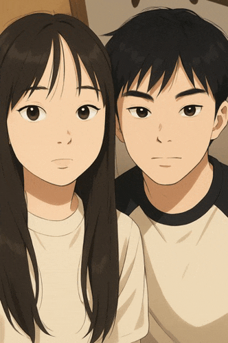 a boy and a girl pose for a picture together