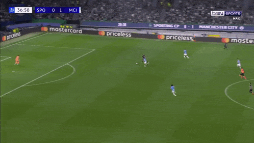a soccer game is being played with qatar airways on the sidelines