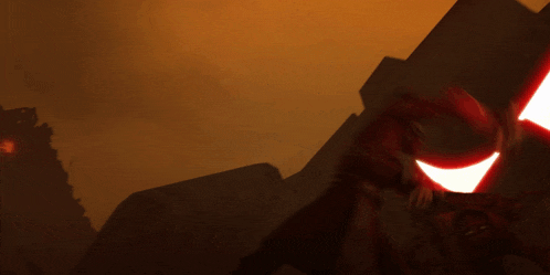 a blurred image of a person holding a red light