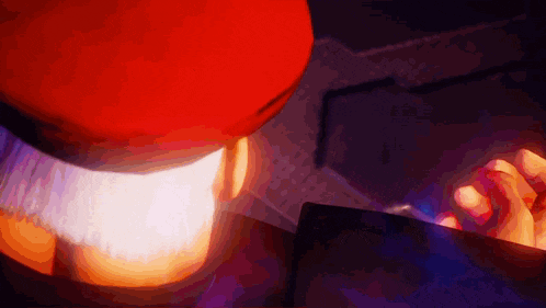 a close up of a person 's face with a red hat