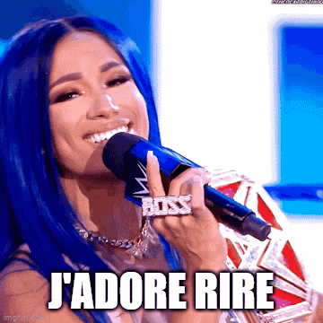 a woman with blue hair is smiling while holding a microphone with the words j'adore rire written below her