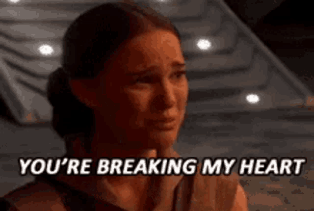 a woman is crying with the words `` you 're breaking my heart '' .