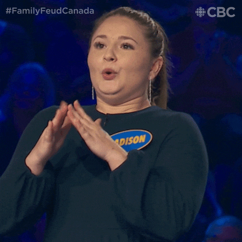 a woman with the name madison on her shirt prays