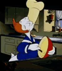 a cartoon of donald duck wearing a chef 's hat and holding a bowl