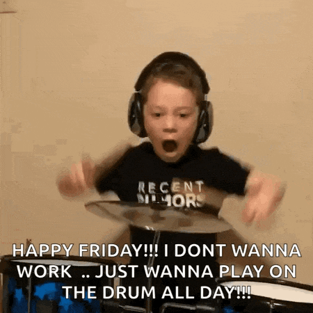 a young boy wearing headphones is playing a drum set