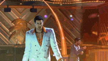 a man in a white suit stands in a room