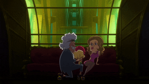 a man and a woman are sitting on a red couch