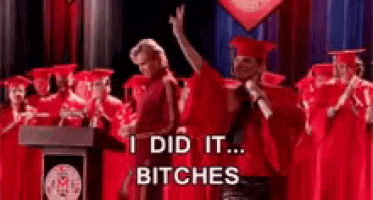 a woman is giving a speech at a graduation ceremony and says i did it ... bitches