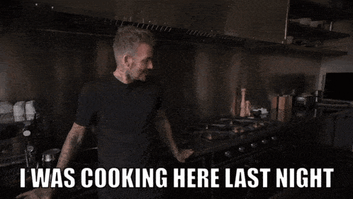 a man standing in a kitchen with the words i was cooking here last night above him
