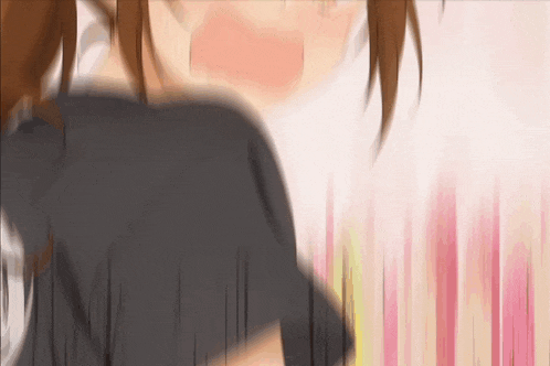 a blurry image of a girl 's face with a pink background