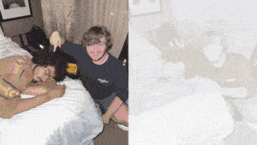 a man laying on a bed next to another man wearing a t-shirt that says nautica