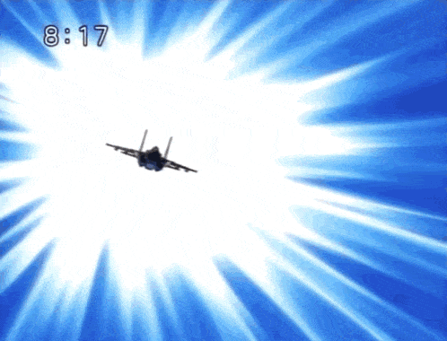 a plane is flying through a blue sky with 8:17 on the bottom
