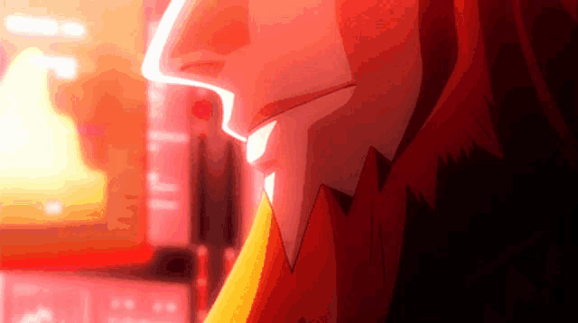 a close up of a person 's face with a red background .