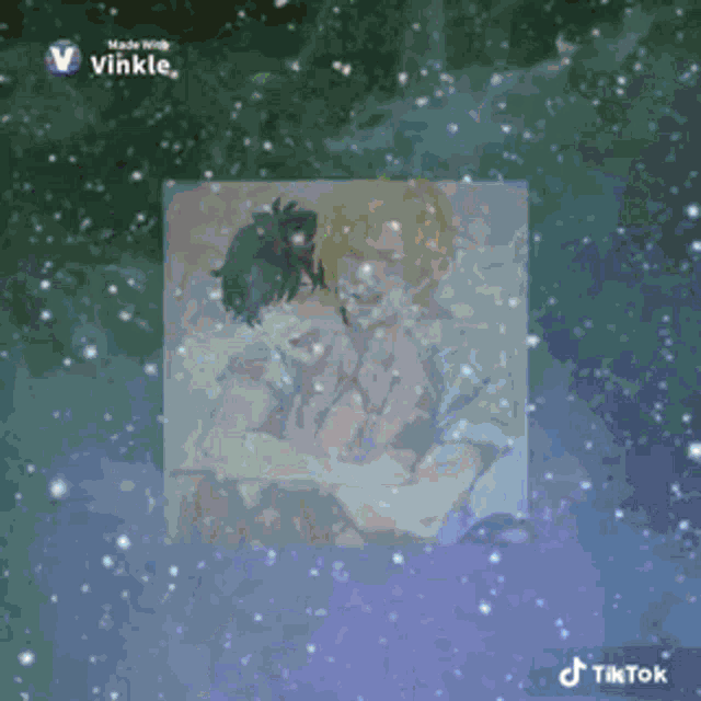a picture of two people hugging each other is surrounded by snowflakes .