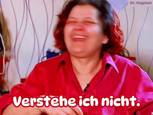 a woman in a red shirt is laughing with the words verstehe ich nicht below her