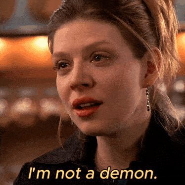 a woman says i 'm not a demon while looking at the camera