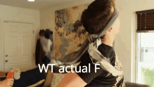 a person with a scarf around their head and the words wt actual f