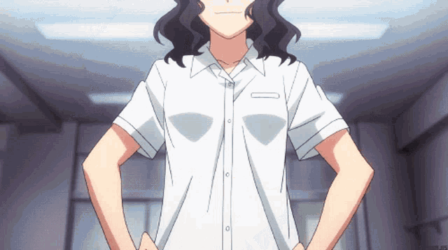 a girl in a white shirt is standing with her hands on her hips in a room