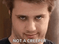 a close up of a man 's face with the words `` not a creeper '' on it .