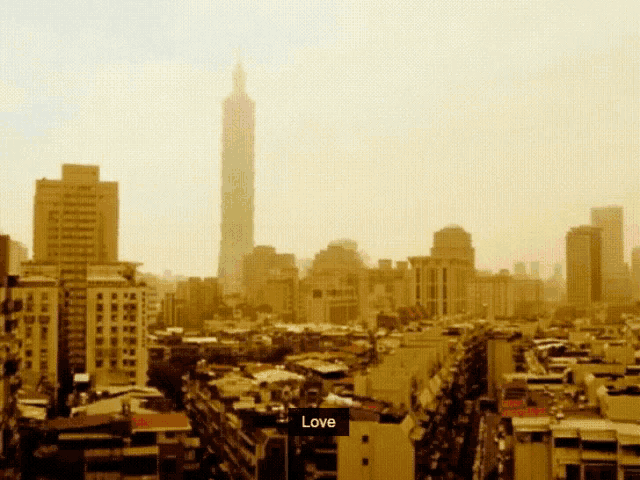 a cityscape with a sign that says love