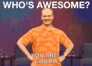a man in an orange shirt is standing with his hands on his hips and says who 's awesome ? you are !