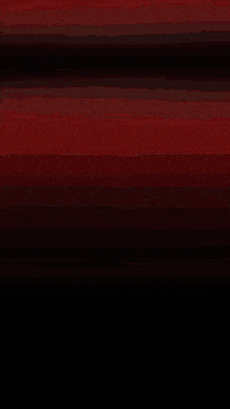 a red light is shining in the dark