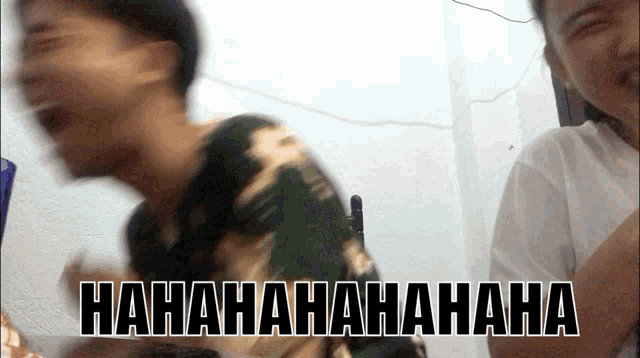 a man is laughing with the words " hahahahaha " behind him
