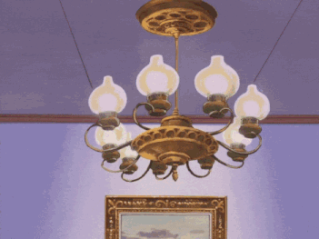 a chandelier is hanging from the ceiling above a picture