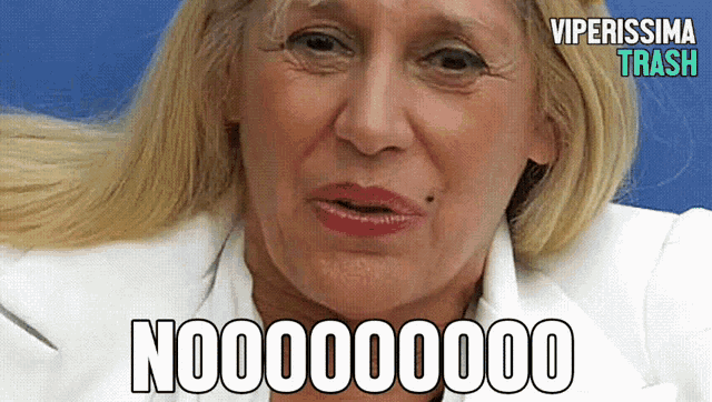 a woman in a white jacket is making a funny face with the words no000000 on the bottom