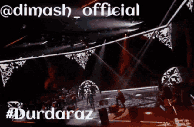 a picture of a stage with the words @dimash_official and #durdaraz at the bottom