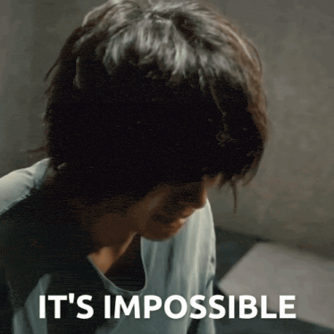 a close up of a person 's face with the words it 's impossible