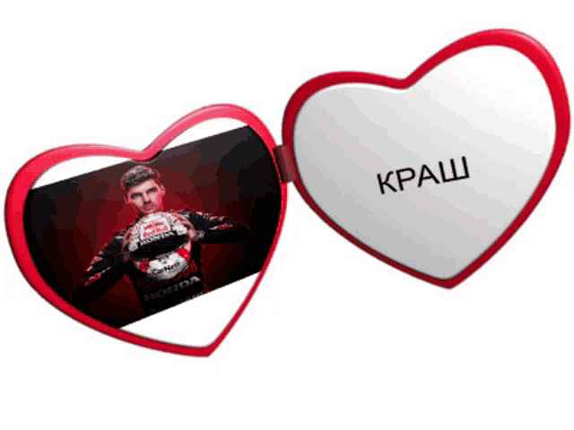 a red and white heart with a picture of a man in a red bull shirt