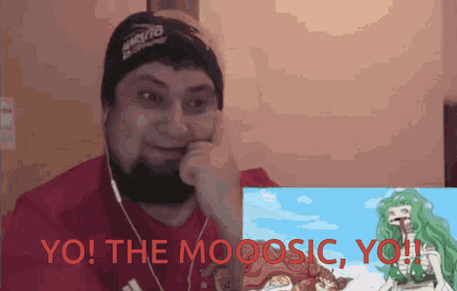 a man with a beard is watching a video with the words yo the moosic yo in red